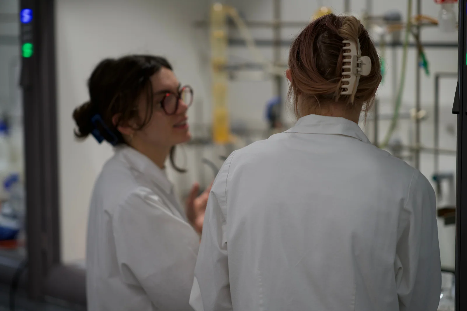 Scientists collaborating in the lab
