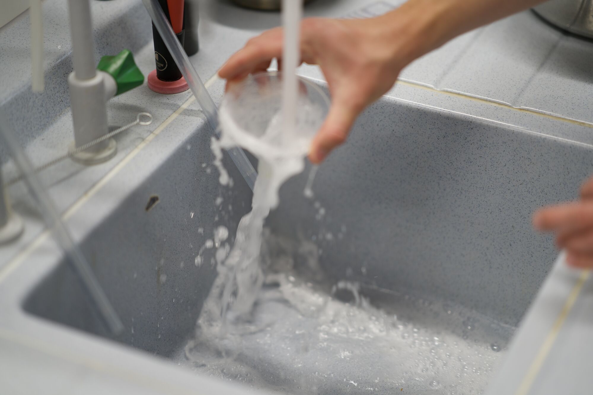 Foam being poured from a beaker
