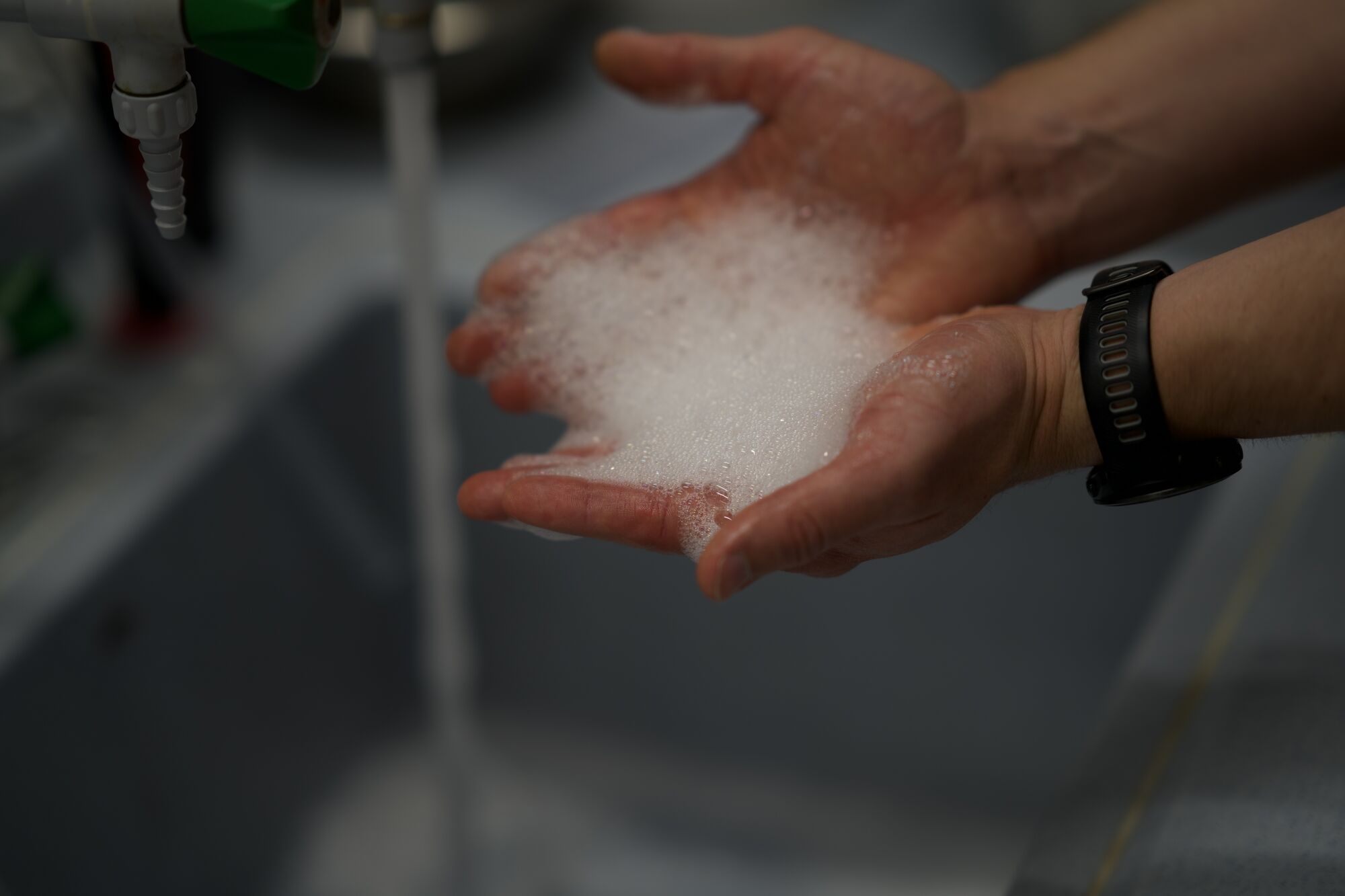 Surfactant foam cupped in a hand