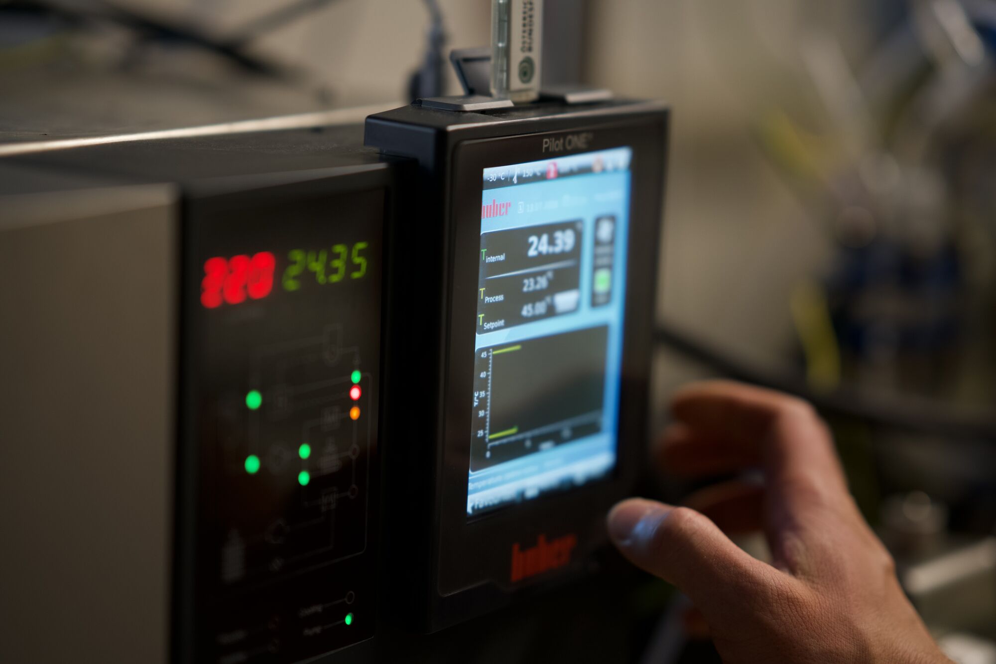 Technician monitoring a reactor control readout