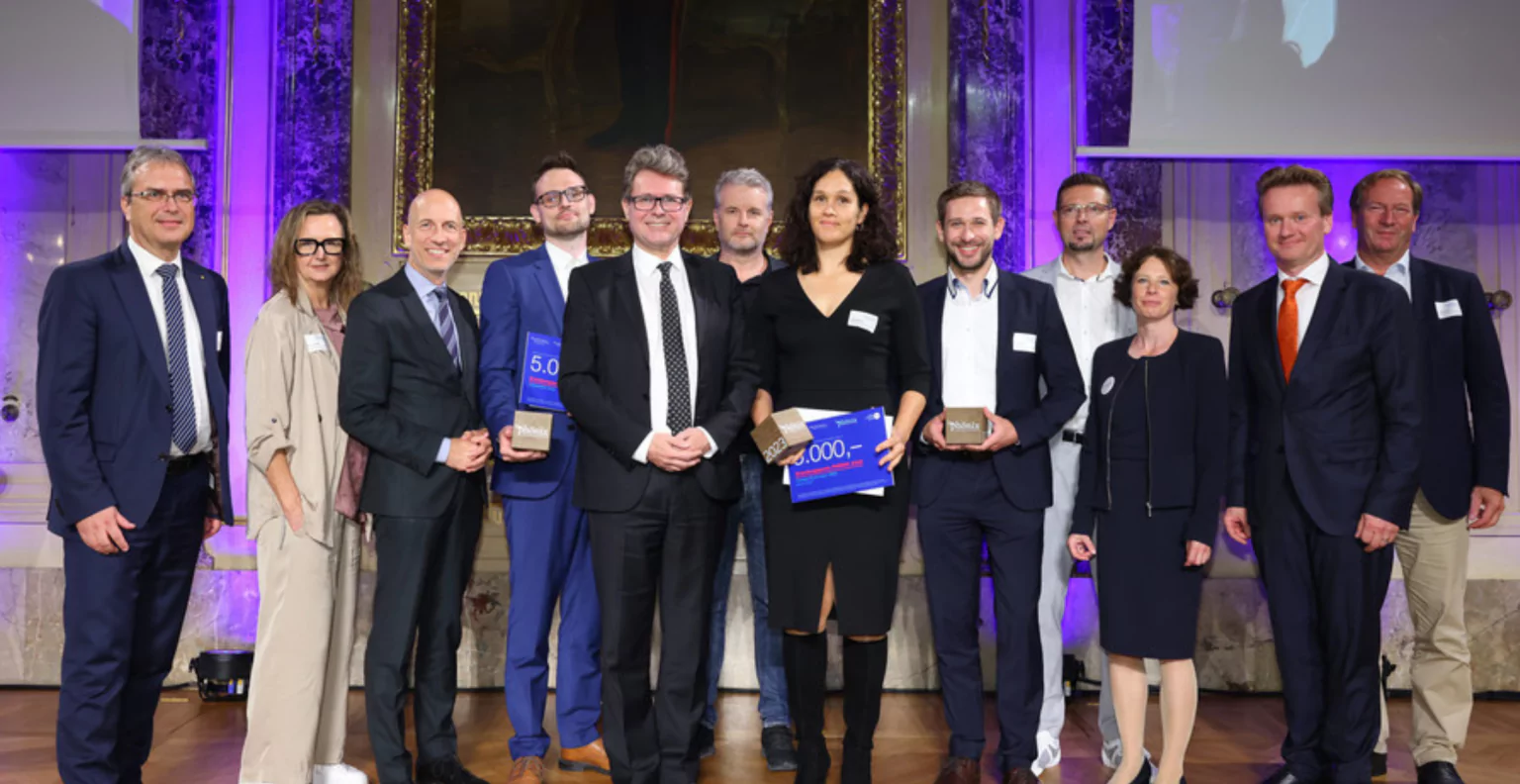 Award ceremony 2023 with PureSurf team members on stage